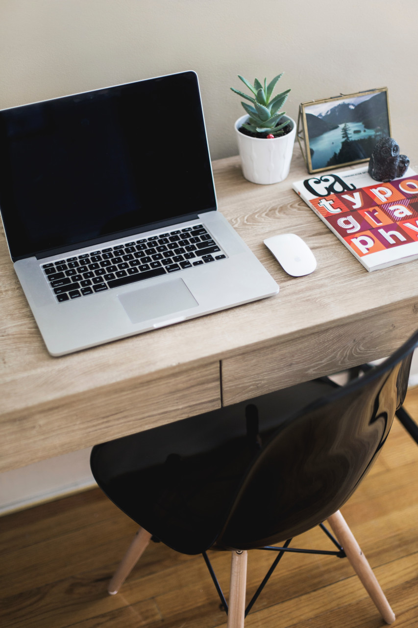 Bookkeeping & Business Advisory - wooden desk with chair